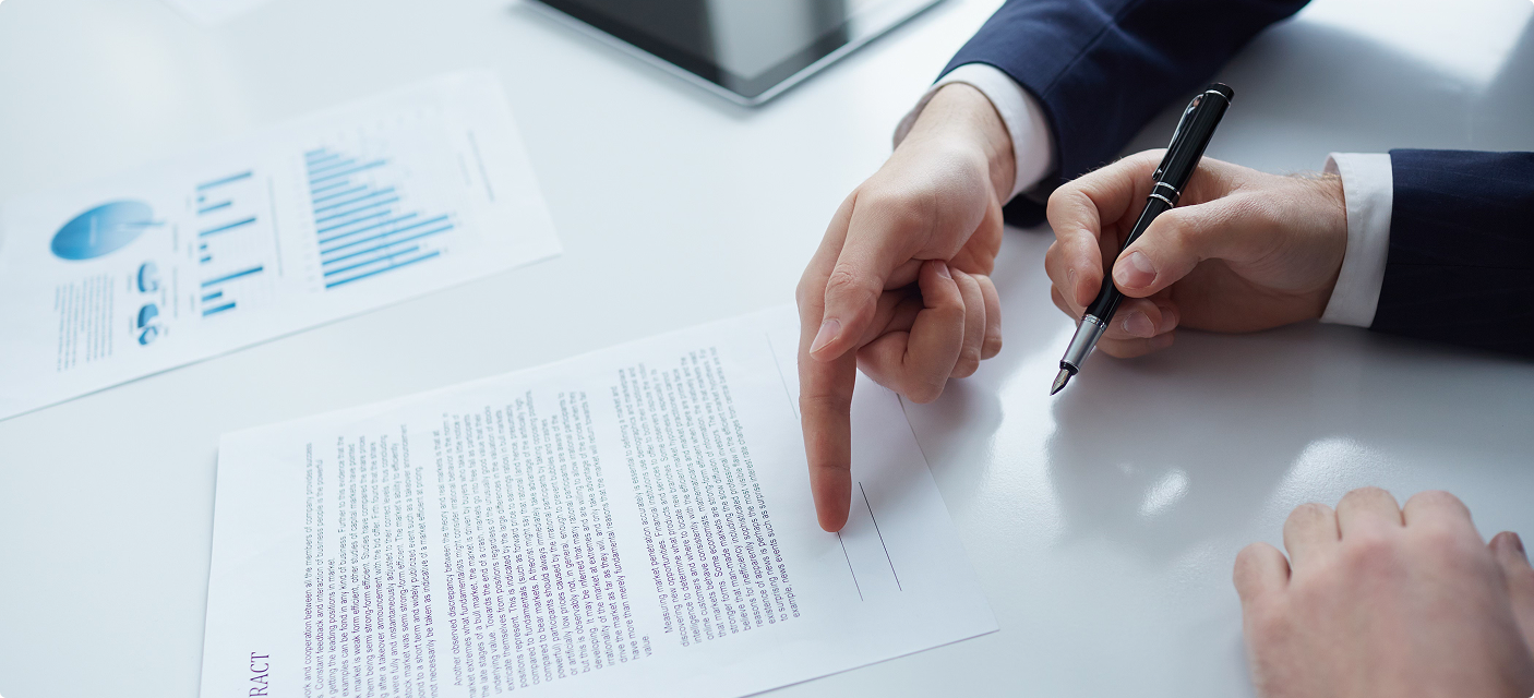 Financial documents on table