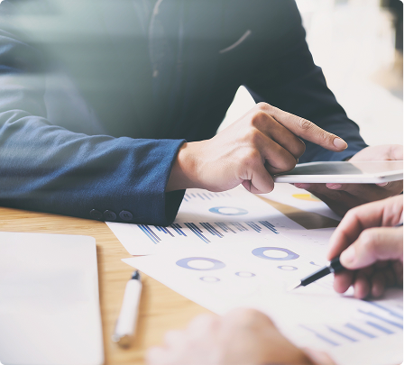 Hands reviewing documents